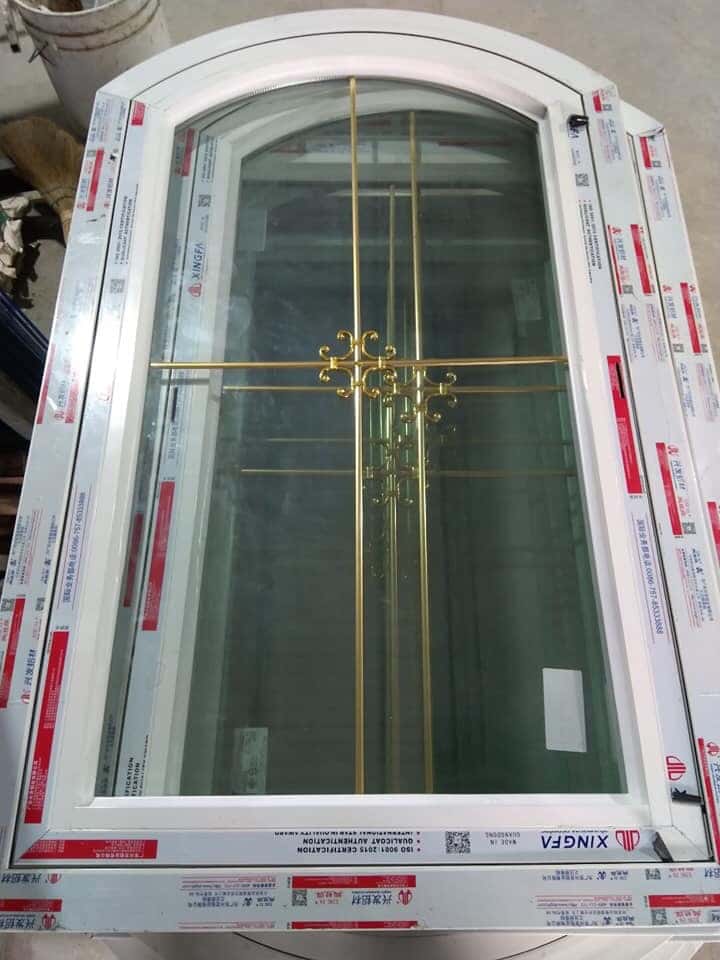 Mẫu cửa nhôm xingfa kính hộp có nan đồng trang trí Mẫu cửa nhôm xingfa kính hộp có nan đồng trang trí