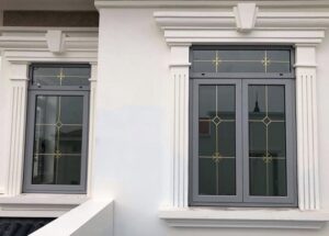 mẫu cửa nhôm xingfa kính hộp nan đồng